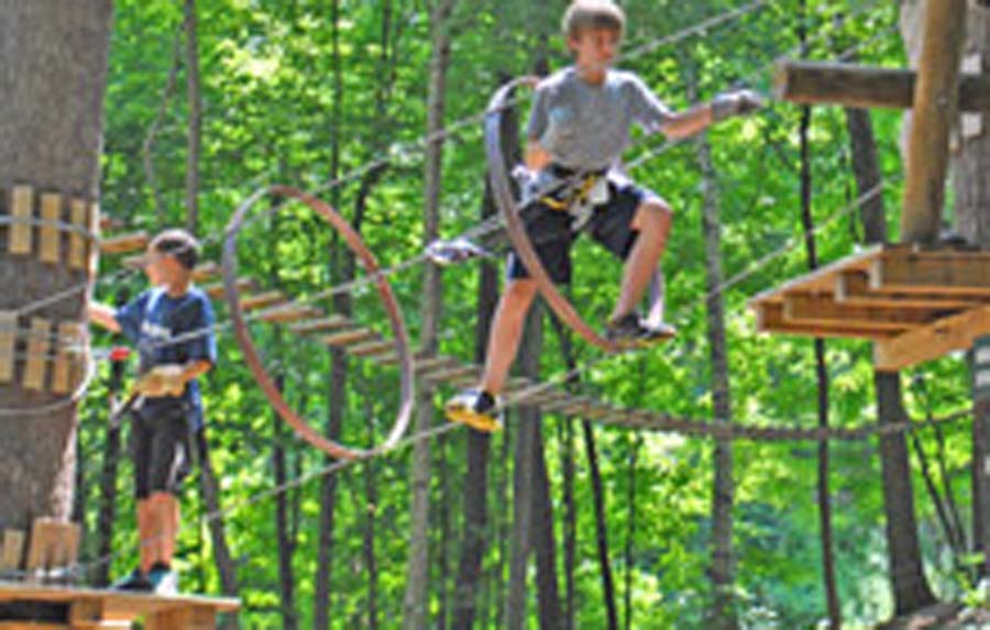 two boys on high wire adventure course