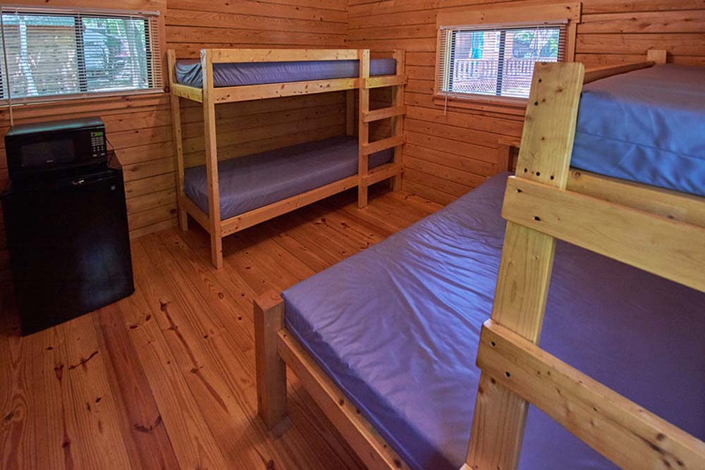 bunkbeds with microwave and small refrigerator